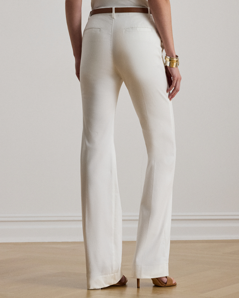 Lauren Ralph Lauren Lauren's elevated interpretation of the stretch-cotton chino trouser features a high rise and a leg-lengthening flare silhouette complemented by crisp creases.
