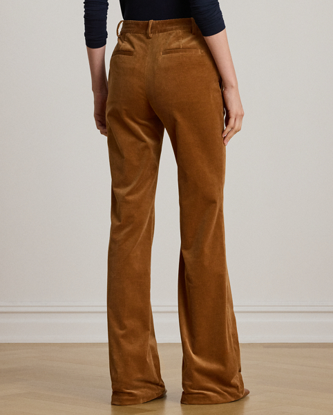 These high-rise trousers showcase a leg-elongating flare silhouette rendered in fine-wale corduroy for subtle texture and a velvety hand feel.