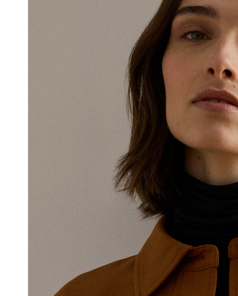 Tailored from soft wool-blend serge, this cropped jacket showcases surplus-inspired, faux-leather buckled tabs and patch pockets. Signature horn-effect buttons complete the look.