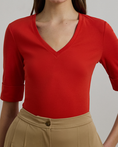 A timeless essential, this V-neck tee with elbow-length sleeves is made with breathable stretch cotton for a soft hand feel. Lauren's signature embroidered logo on the hem completes the look.