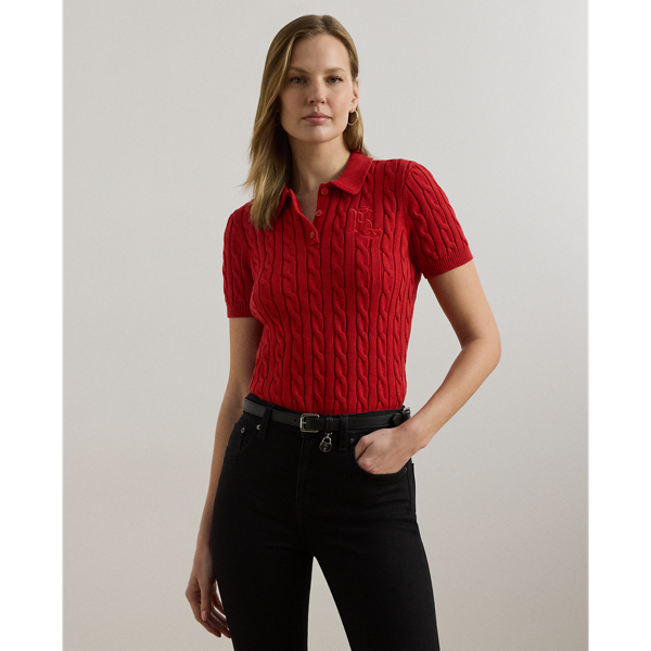 Crafted from combed cotton for a soft hand, this piece unites a timeless Polo shirt silhouette with the comfort of a cable-knit jumper. It's detailed with Lauren's signature embroidered logo and "LRL"-engraved buttons.