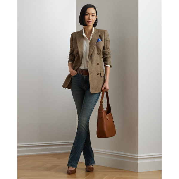 Cut for a chic high rise, these boot jeans are made with comfortable right-hand-twill denim that offers just enough stretch for a relaxed fit and feel.