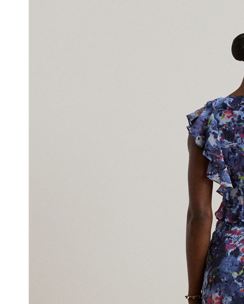 Airy crinkle georgette, ruffle trim and flutter sleeves bring effortless movement to this midi dress, which showcases the season's painterly abstract motif.