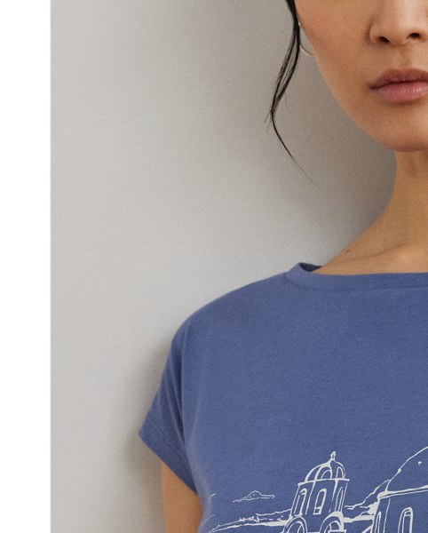 This breathable cotton-blend jersey T-shirt features a Santorini-inspired coastal landscape motif, which is rendered in the style of an ink sketch.