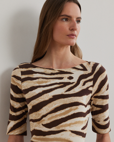 Made from breathable stretch cotton for a soft hand feel, this version of Lauren Ralph Lauren Lauren's essential boatneck tee is enlivened by the season's eye-catching zebra print. An “LRL”-embroidered logo on the hem adds a subtle signature finish.