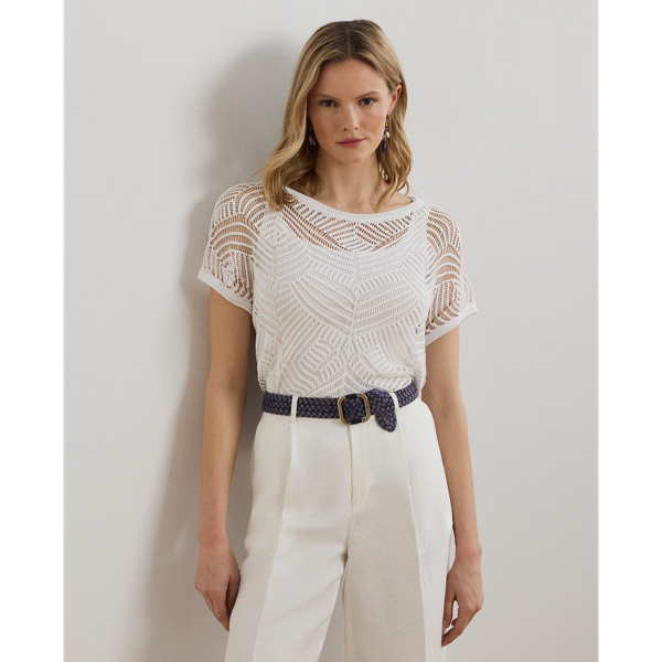A geometric mesh stitch pattern brings dimension and visual intrigue to this jumper, which is perfect for transitional dressing thanks to its short-sleeve design and lightweight construction.