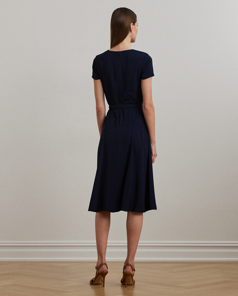 Detailed with a signature plaque on the neck, this fit-and-flare dress is rendered in silky georgette for a luxurious hand and sweeping movement. A faux-leather "LRL"-engraved buckled self-belt completes the look.