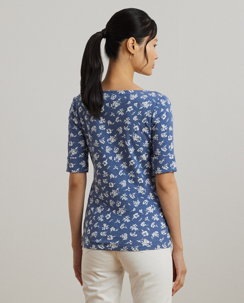 Made from breathable stretch cotton for a soft hand feel, this version of Lauren Ralph Lauren Lauren's essential boatneck T-shirt is refreshed for the season with an enchanting, two-tone floral motif. An "LRL"-embroidered logo on the hem adds a subtle signature finish.
