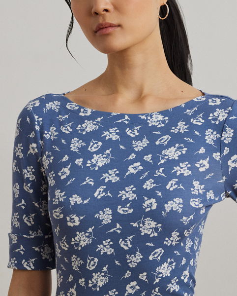 Made from breathable stretch cotton for a soft hand feel, this version of Lauren Ralph Lauren Lauren's essential boatneck T-shirt is refreshed for the season with an enchanting, two-tone floral motif. An "LRL"-embroidered logo on the hem adds a subtle signature finish.