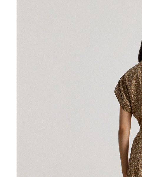 Crafted from airy crepe de chine, this dress balances a spread collar and roll-tab sleeves with a feminine surplice neckline to create a look that is casual yet refined. Detailed with "LRL"-engraved buttons, this version displays a stylised, equestrian-inspired geometric print.