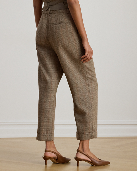 Cut for a cropped, slightly tapered silhouette, these stylish trousers are rendered in a soft cotton-and-wool-blend yarn dyed with a timeless Glen plaid pattern. Crisp creases, pleats and waist darts provide a tailored finish.