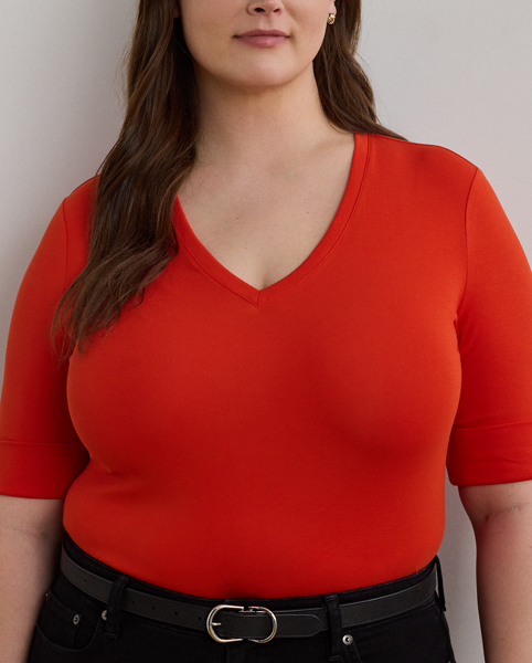 A timeless essential, this V-neck tee with elbow-length sleeves is made with breathable stretch cotton for a soft hand feel. Lauren's signature embroidered logo on the hem completes the look.