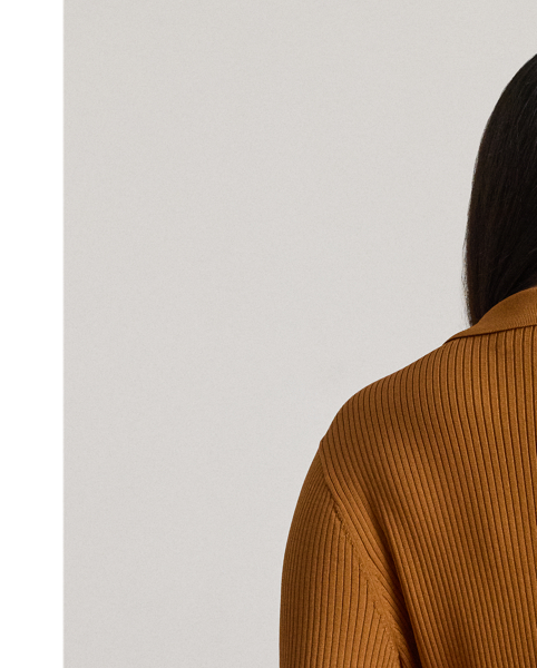 Anchored in  Ralph Lauren Lauren's refined aesthetic, this Polo cardigan features a rib-knit pattern and a slim-fitting silhouette. "Lauren  Ralph Lauren Lauren"-engraved buttons complete the look.