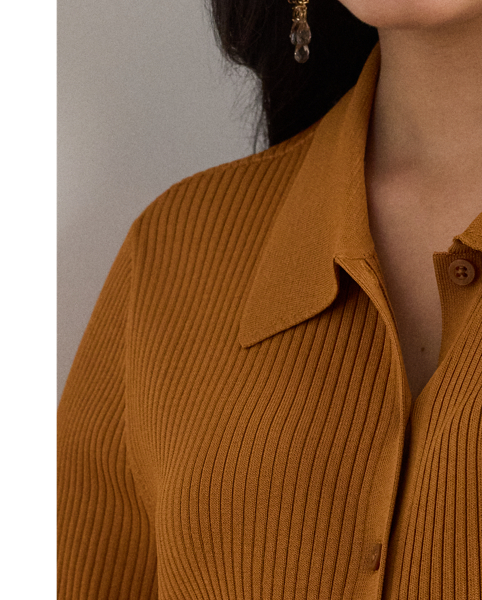 Anchored in  Ralph Lauren Lauren's refined aesthetic, this Polo cardigan features a rib-knit pattern and a slim-fitting silhouette. "Lauren  Ralph Lauren Lauren"-engraved buttons complete the look.