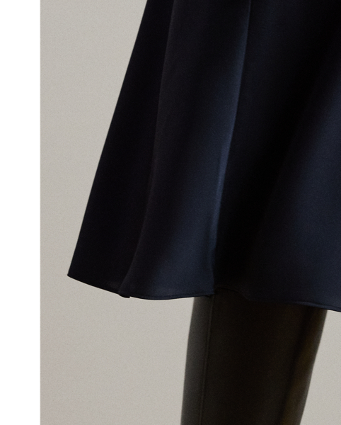 An elevated addition to your wardrobe, this midi skirt is realised in luxuriously smooth satin charmeuse for a fluid drape and lustrous finish.
