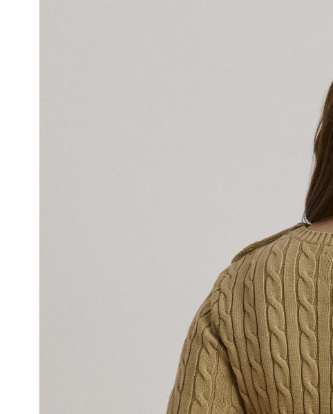 Lauren  Ralph Lauren Lauren updates the classic cable-knit jumper with signature button embellishments on the shoulder and an "LRL"-embroidered logo on the chest. Cut for a slim-fitting silhouette, it's knit from combed cotton for a soft hand.