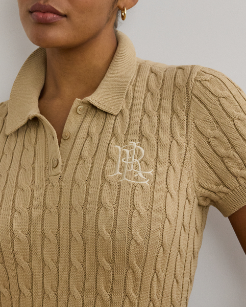 Crafted from combed cotton for a soft hand, this piece unites a timeless Polo shirt silhouette with the comfort of a cable-knit jumper. It's detailed with Lauren's signature embroidered logo and "LRL"-engraved buttons.