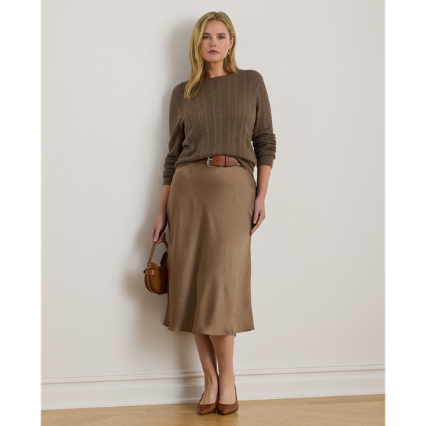 A staple piece that can be easily dressed up or down, this midi skirt is rendered in silky satin charmeuse for a fluid drape and subtle sheen.