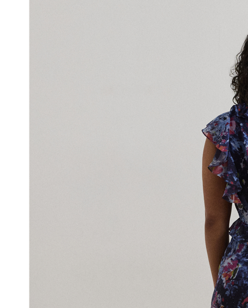 Airy crinkle georgette, ruffle trim and flutter sleeves bring effortless movement to this midi dress, which showcases the season's painterly abstract motif.