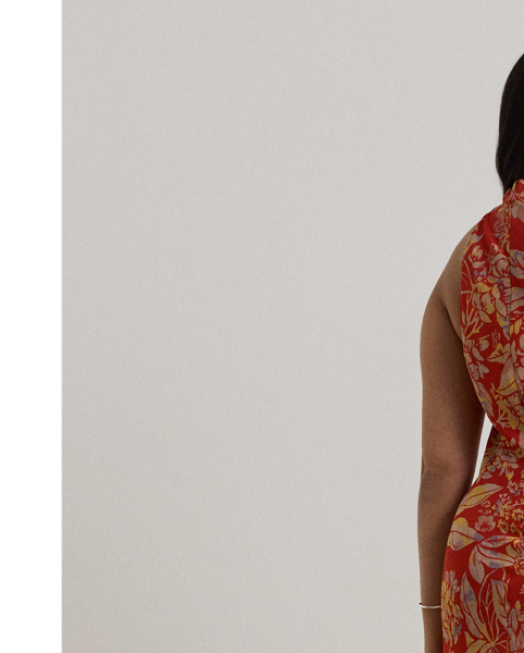 Featuring a bamboo-inspired metal embellishment at the neckline, this enchanting halter dress is crafted from crinkle georgette printed with the season's painterly floral motif.