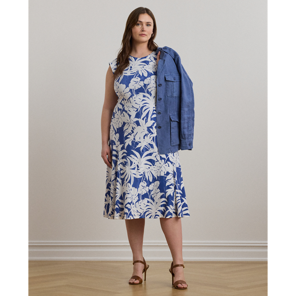 Crafted with smooth stretch jersey for a soft hand and fluid drape, this cap-sleeve dress depicts a palm-frond print in hues of white and blue.