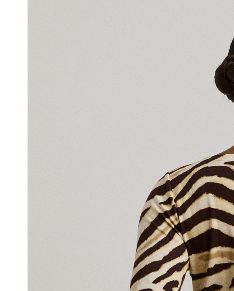 Made from breathable stretch cotton for a soft hand feel, this version of Lauren  Ralph Lauren Lauren's essential boatneck tee is enlivened by the season's eye-catching zebra print. An “LRL”-embroidered logo on the hem adds a subtle signature finish.