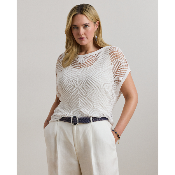 A geometric mesh stitch pattern brings dimension and visual intrigue to this jumper, which is perfect for transitional dressing thanks to its short-sleeve design and lightweight construction.