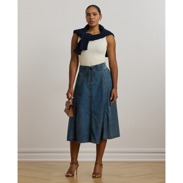 Vertical seams beautifully enhance the A-line silhouette of this denim midi skirt, while a drawcord waist offers effortless appeal.
