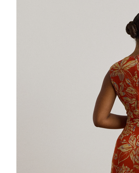 An eye-catching twist-front detail on the bodice serves as the focal point of this cap-sleeve dress, which is crafted from stretch-infused jersey for a soft feel and ease of movement. This version displays a painterly floral motif against a vibrant red backdrop.