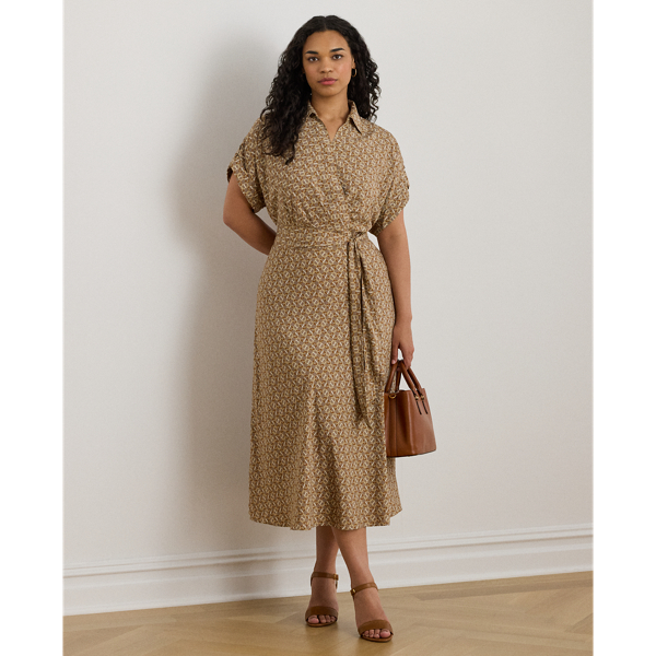 Crafted from airy crepe de chine, this dress balances a spread collar and roll-tab sleeves with a feminine surplice neckline to create a look that is casual yet refined. Detailed with "LRL"-engraved buttons, this version displays a stylised, equestrian-inspired geometric print.