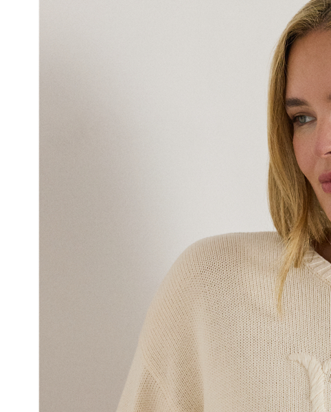 Knit with ultra-soft combed cotton, this relaxed-fitting crewneck jumper features an oversize embroidered monogram on the chest for unmistakable Lauren  Ralph Lauren Lauren style.