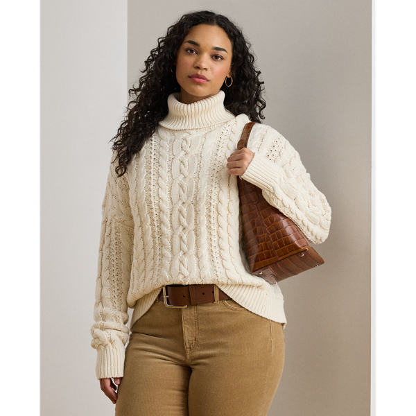 A timeless cold-weather staple, this roll neck jumper showcases a relaxed-fitting, cable-knit silhouette in a soft cotton blend.