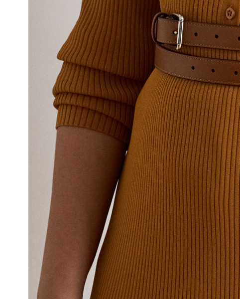 A rib-knit pattern brings subtle dimension to the pencil silhouette of this midi skirt, which is finished with a slit on the side seam for ease of movement.