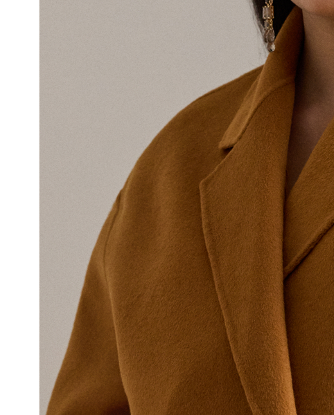 Tailored with a double-faced wool blend, this coat pairs a traditional double-breasted design with a modern cocoon silhouette. "Lauren  Ralph Lauren Lauren"-engraved horn-effect buttons heighten this style's refined appeal.