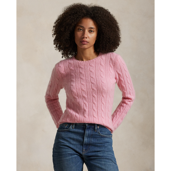 Inspired by fishermen's ropes, the cable-knit jumper's defining motif has transformed from a practical, hard-wearing construction into a symbol of collegiate style. This version is crafted from luxuriously soft cashmere, which is spun and dyed in a renowned Italian mill.