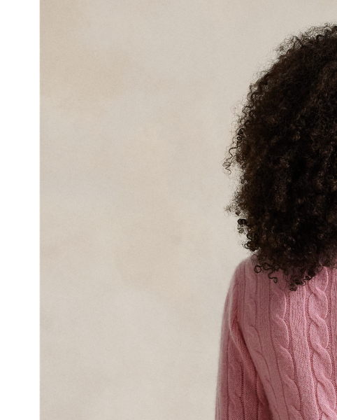 Inspired by fishermen's ropes, the cable-knit jumper's defining motif has transformed from a practical, hard-wearing construction into a symbol of collegiate style. This version is crafted from luxuriously soft cashmere, which is spun and dyed in a renowned Italian mill.