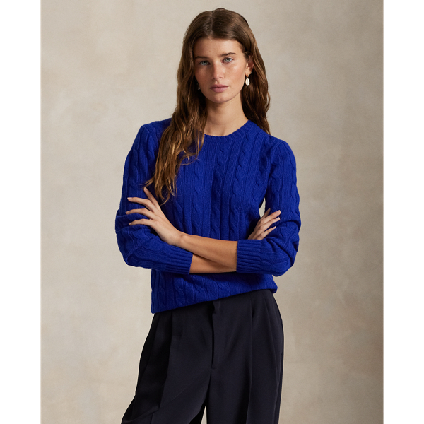 Inspired by fishermen's ropes, the cable-knit jumper's defining motif has transformed from a practical, hard-wearing construction into a symbol of collegiate style. This version is crafted from luxuriously soft cashmere, which is spun and dyed in a renowned Italian mill.