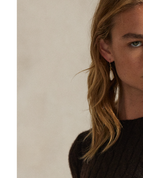 Inspired by fishermen's ropes, the cable-knit jumper's defining motif has transformed from a practical, hard-wearing construction into a symbol of collegiate style. This version is crafted from luxuriously soft cashmere, which is spun and dyed in a renowned Italian mill.