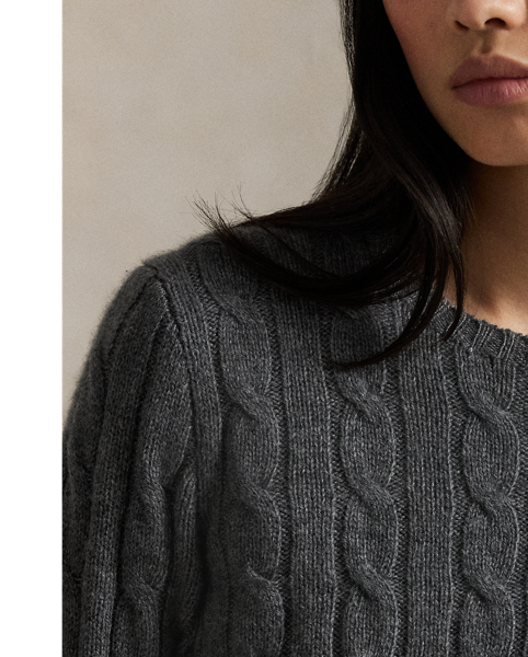 Inspired by fishermen's ropes, the cable-knit jumper's defining motif has transformed from a practical, hard-wearing construction into a symbol of collegiate style. This version is crafted from luxuriously soft cashmere, which is spun and dyed in a renowned Italian mill.