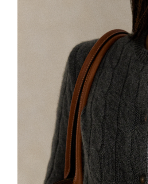 This slim-fitting crewneck cardigan is made from chunky cashmere yarn in our iconic cable-knit construction.