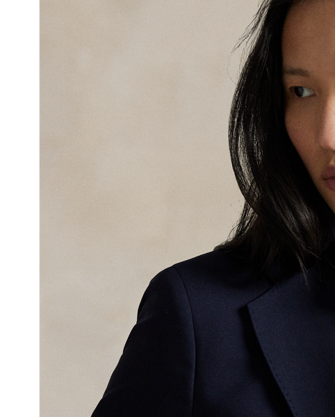 Crafted with stretch-blend wool, this expertly tailored blazer is fully lined, fitted through the waist and features a slightly flared hem.