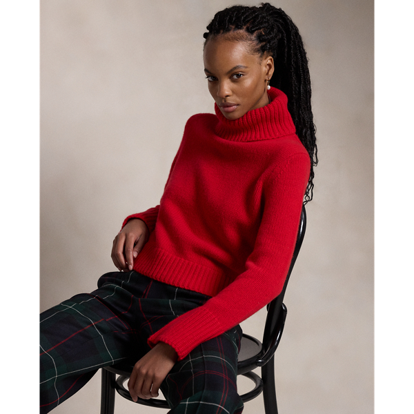 This oversize roll neck jumper is crafted from a marled blend of wool and carded cashmere.