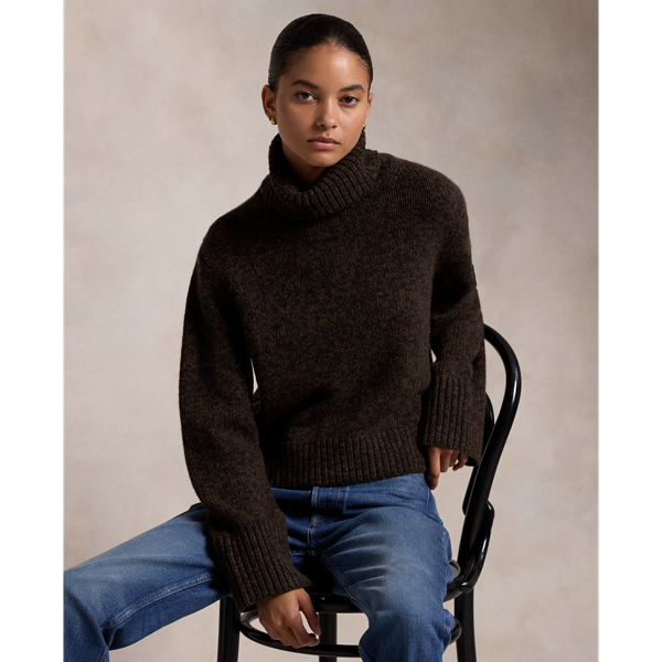 This oversize roll neck jumper is crafted from a marled blend of wool and carded cashmere.