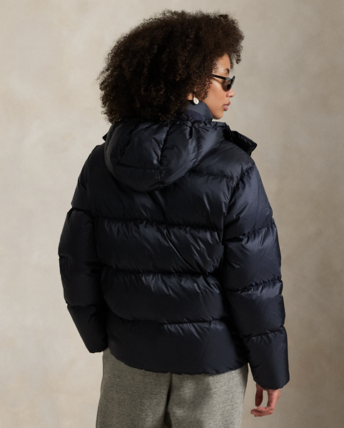 Made with water-repellent fabric, this 750-fill-power down jacket is designed with a detachable hood, snapped storm placket and zip pocketing on the chest and waist. Our signature Pony is embroidered on the chest for pure Polo style.