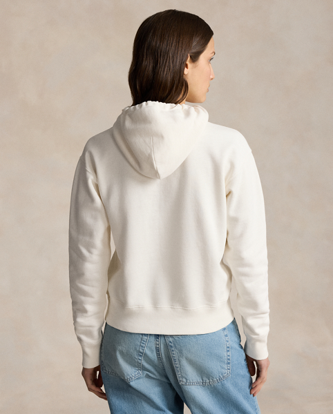 Reflecting the relaxed ease and timeless spirit of Polo Ralph Lauren Lauren, this cotton-blend-fleece hoodie is washed for softness and printed with a graphic Polo Bear duo inspired by Ralph Lauren and Ricky Lauren.
