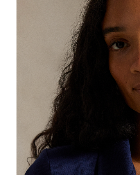 Crafted with stretch cotton piqué for a slim fit, this short-sleeve shirt unites a classic ribbed Polo collar and a full-buttoned placket. Our signature embroidered Pony adorns the chest.