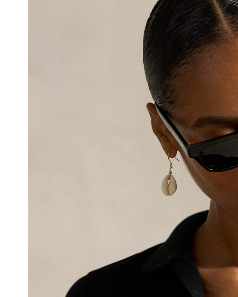 Crafted with stretch cotton piqué for a slim fit, this short-sleeve shirt unites a classic ribbed Polo collar and a full-buttoned placket. Our signature embroidered Pony adorns the chest.