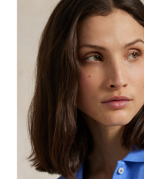 Crafted with stretch cotton piqué for a slim fit, this short-sleeve shirt unites a classic ribbed Polo collar and a full-buttoned placket. Our signature embroidered Pony adorns the chest.