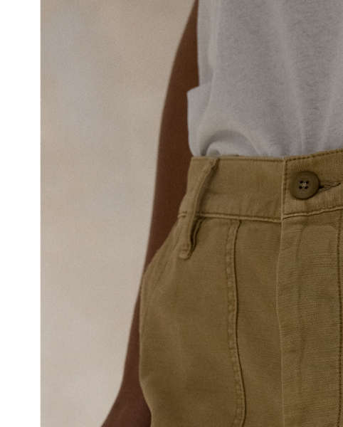 The Ricky Trouser combines smooth cotton sateen with adjustable buttoned tabs on the waist and utility-inspired pocketing. This version has been specially dyed to create distinct nuances in shading, which give each piece a unique character and a slightly faded, timeworn look.