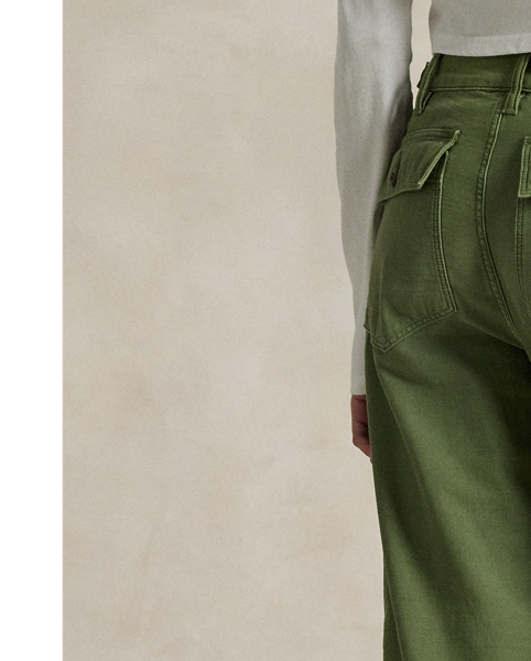 The Ricky Trouser combines smooth cotton sateen with adjustable buttoned tabs on the waist and utility-inspired pocketing. This version has been specially dyed to create distinct nuances in shading, which give each piece a unique character and a slightly faded, timeworn look.